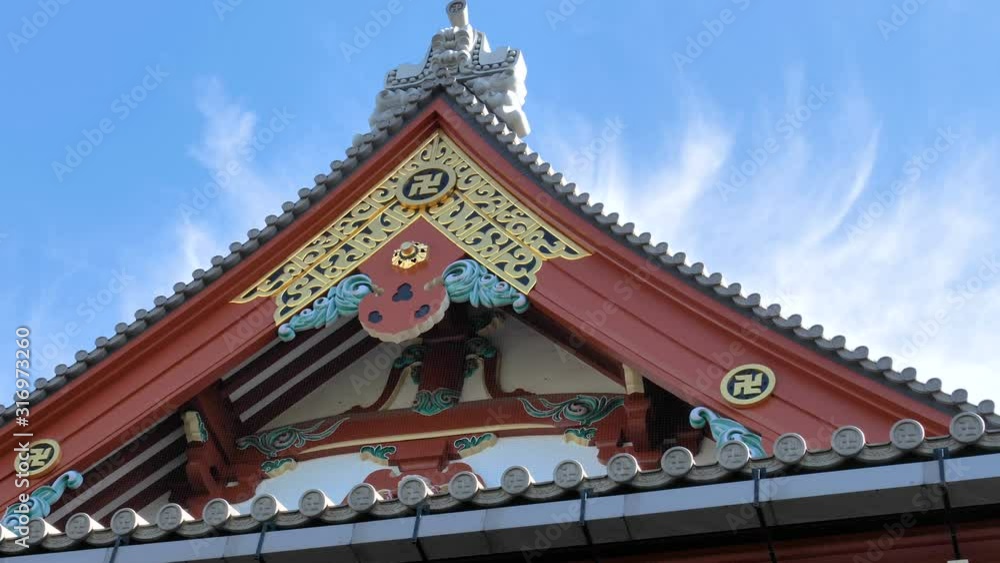 The gold details on the roof of the temple in Tokyo Japan The gold details on the roof of the temple in Tokyo Japan