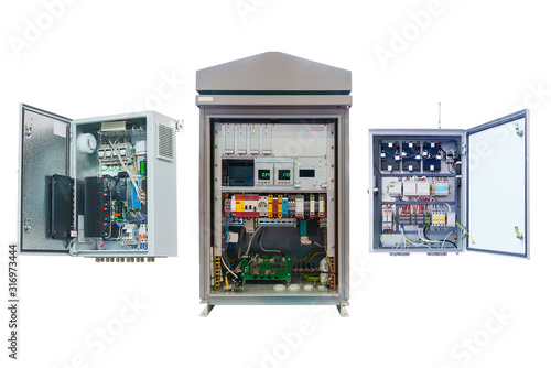 three electrical control сabinet with an open door isolated on a white background