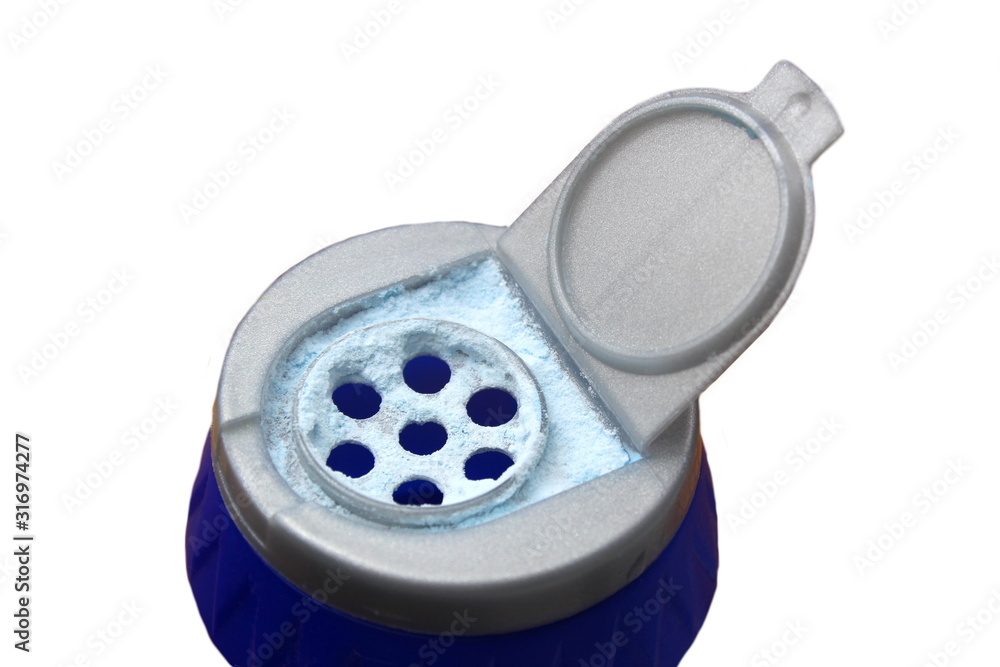 Kitchen cleaner on the background of a washing sponge Kitchen cleaner on the background of a washing sponge