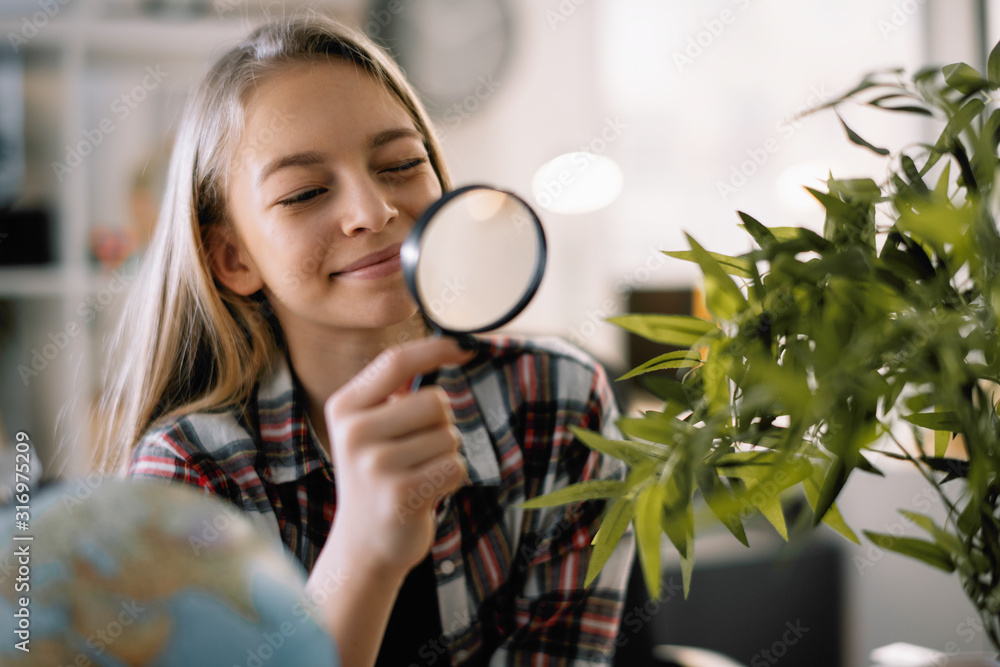 Little explorer. Cute curious girl with magnifying glass. Little explorer. Cute curious girl with magnifying glass.