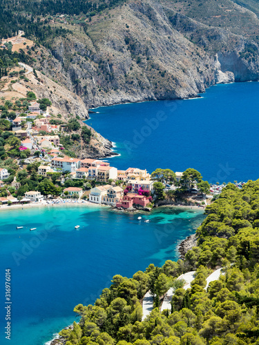 The quaint small beach town of assos asos on the greek island kefalonia is picture perfect greece photo
