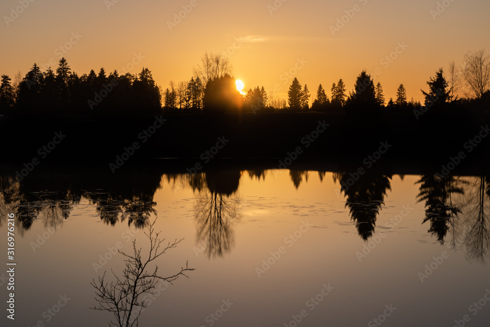 Beautiful sunset on river Kymijoki at winter, Finland.
