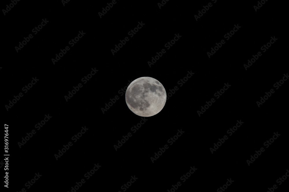 Full moon on the black sky background Full moon on the black sky background