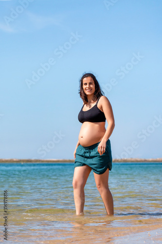 Fototapeta Naklejka Na Ścianę i Meble -  Pregnant woman having fun
