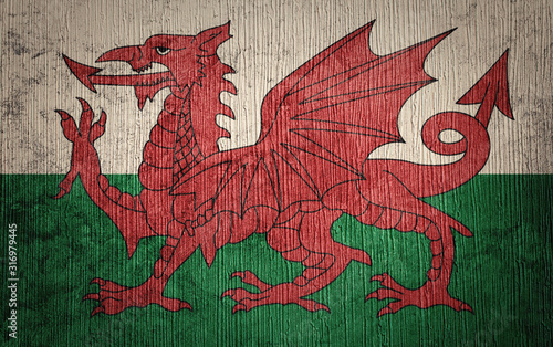 Fotografie Grunge Welsh flag. Welsh flag with grunge texture.