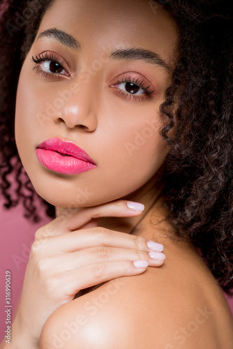 portrait of beautiful african american girl  isolated on pink