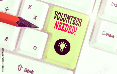 Text sign showing Volunteer Needed. Business photo showcasing asking demonstrating to work for organization without being paid photo