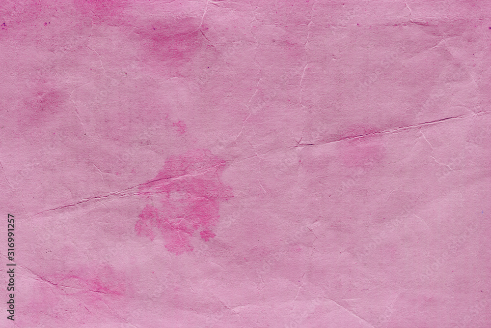Fototapeta premium Cardboard pink abstract pattern texture close-up. Retro old paper background. Grunge concrete wall. Vintage blank wallpaper.