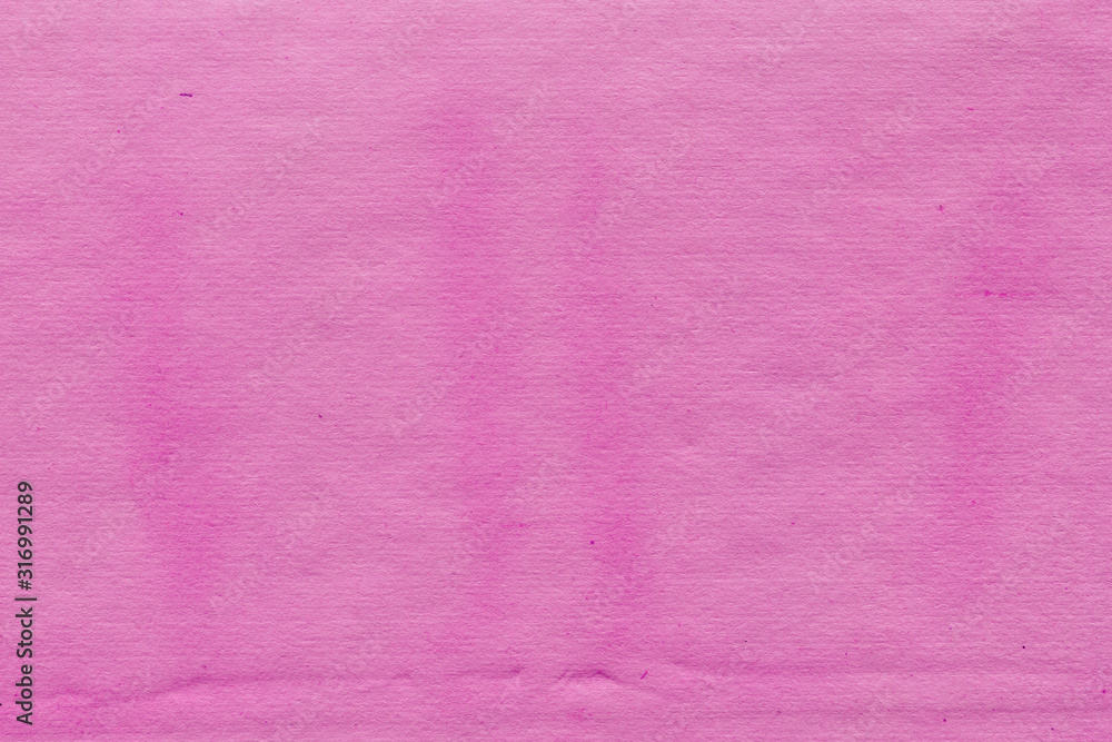 Fototapeta premium Cardboard pink abstract pattern texture close-up. Retro old paper background. Grunge concrete wall. Vintage blank wallpaper.