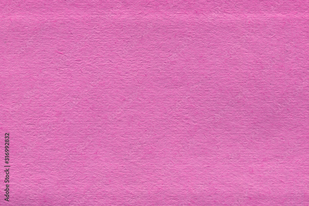Fototapeta premium Cardboard pink abstract pattern texture close-up. Retro old paper background. Grunge concrete wall. Vintage blank wallpaper.