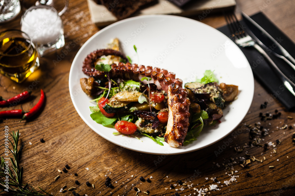 Octopus salad served on a plate in restaurant