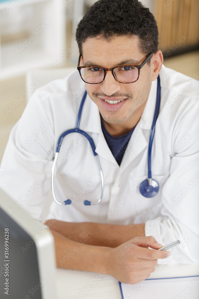 confident doctor looking at camera confident doctor looking at camera