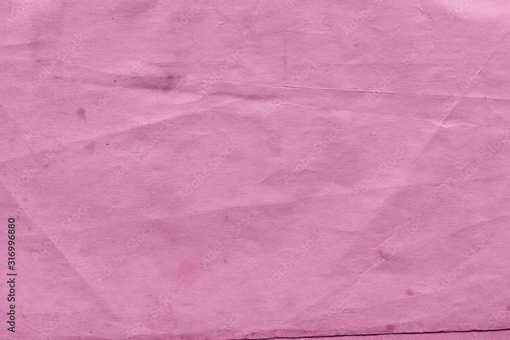 Fototapeta premium Cardboard pink abstract pattern texture close-up. Retro old paper background. Grunge concrete wall. Vintage blank wallpaper.