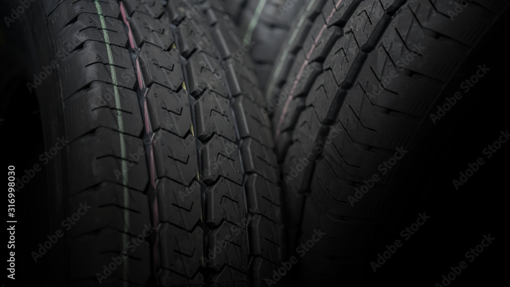 car tires new macro, fragment, blurred background car tires new macro, fragment, blurred background