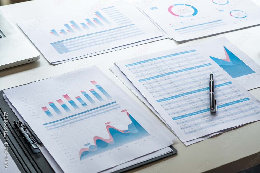 businessman working calculate data document graph chart report marketing research development planning management strategy analysis financial accounting. Business office concept. businessman working calculate data document graph chart report marketing research development planning management strategy analysis financial accounting. Business office concept.