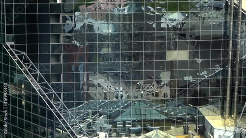 Wallpaper Mural Abstract video. The movement of city life in the reflection of a mirrored building Torontodigital.ca
