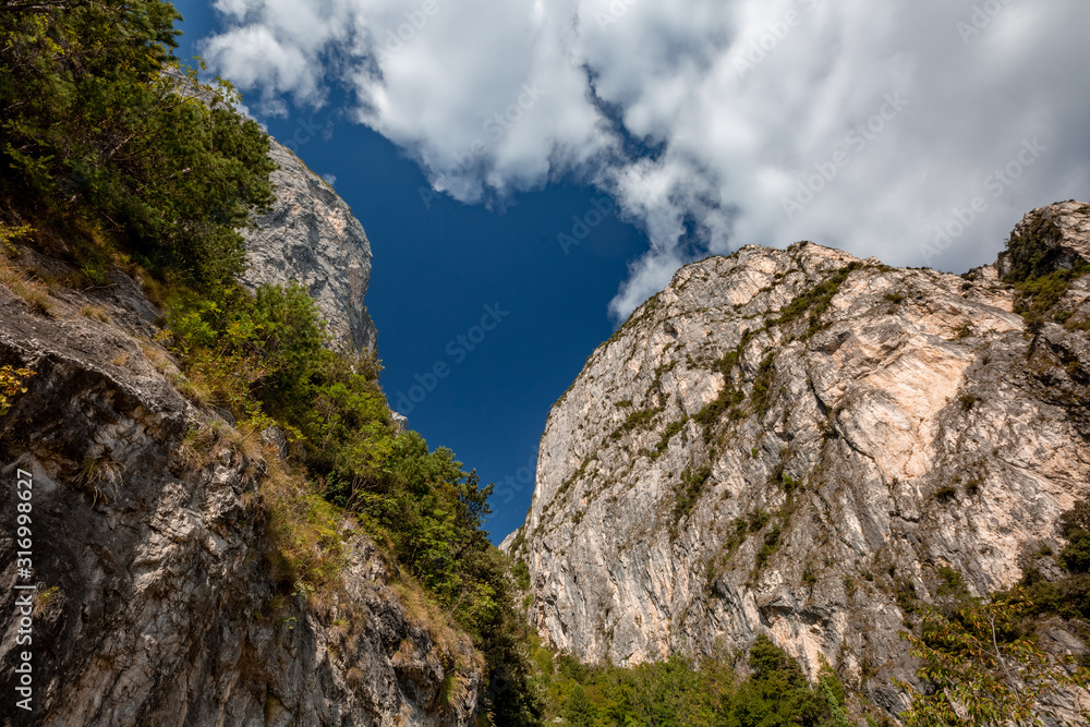 Mountain scenic alpine panoramic landscape, blue skies, coastline