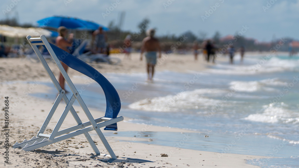 deck chair in the wind on the varadero beach, cuba