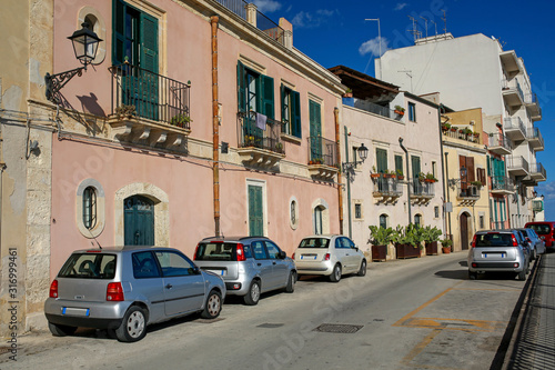 picturesque sea promenade in Ortigia, oldest part of the beautiful baroque city of Syracuse in Sicily, Italy