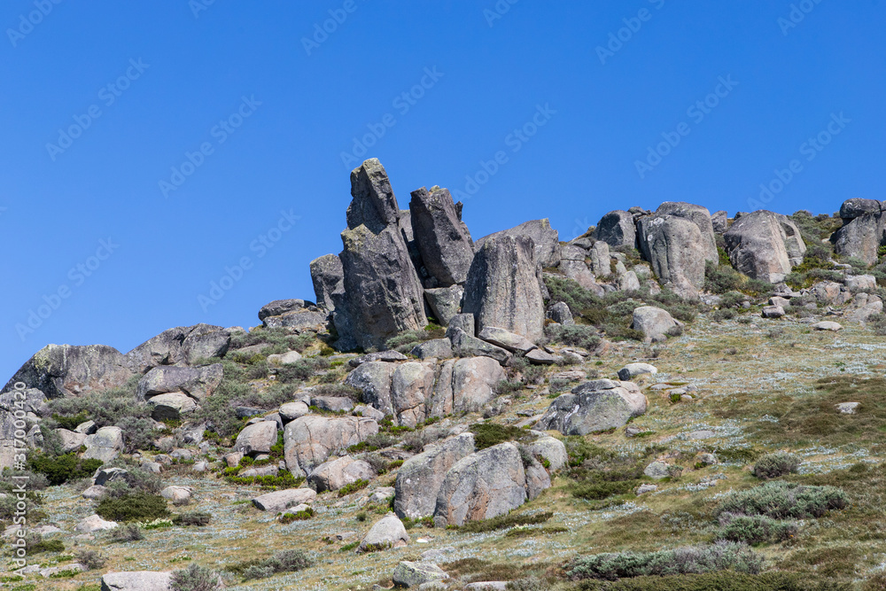 Rock formation on the mountainous with clear blue sky.