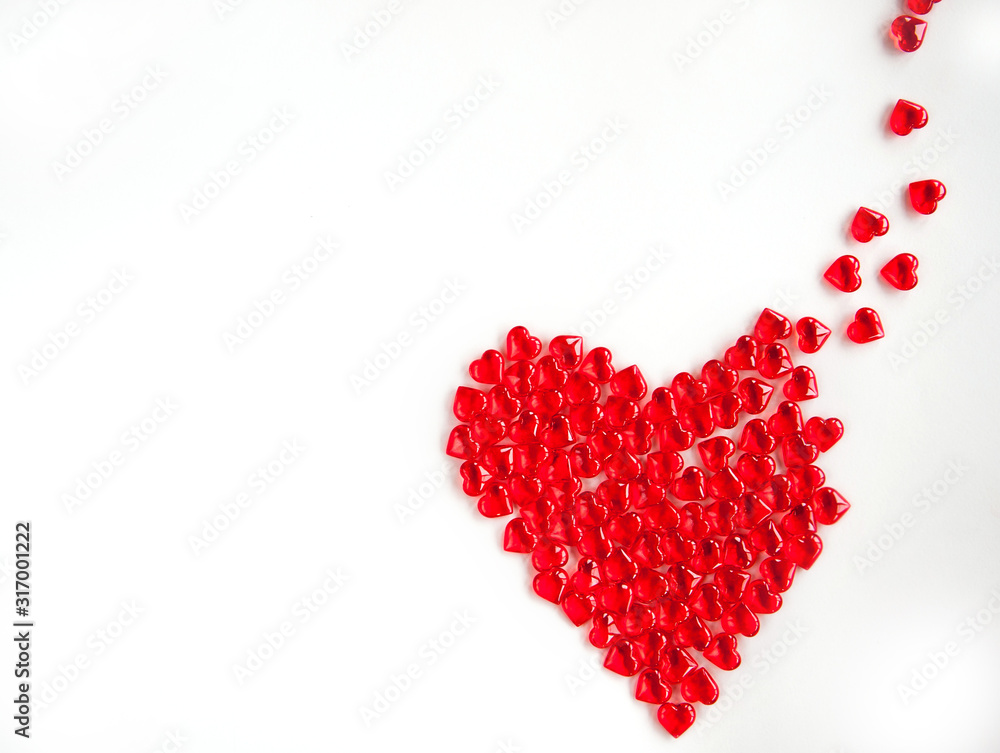 A large red heart made of small hearts on a white background. The concept of Valentine's day. The concept of love