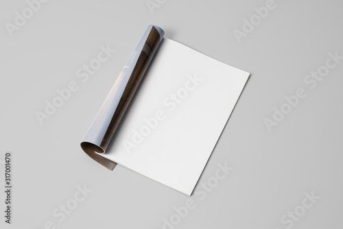 Mock-up magazine, newspaper or catalog on gray background. Blank page