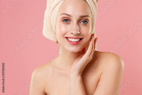 Close up blonde half naked woman 20s perfect skin nude make up blue eyes isolated on pastel pink wall background studio portrait. Skin care healthcare cosmetic procedures concept. Mock up copy space.