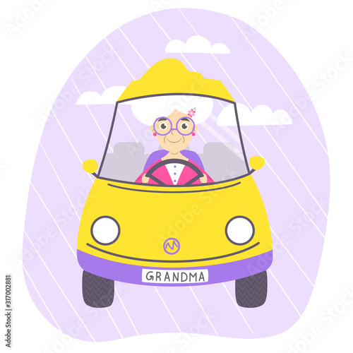 Cheerful smiling grandma driving yellow car