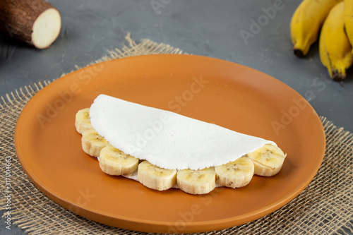 Banana Tapioca, a tradicional Brazilian food. Made from starch of cassava. With flavor of banana photo