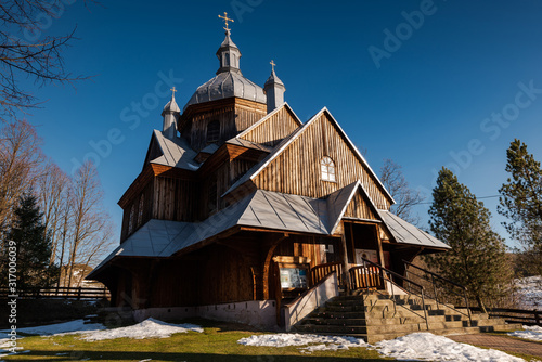 Exterior of Hoszow Wooden Orthodox Church.  Bieszczady Architecture in Winter. Carpathia Region in Poland