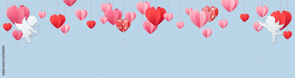 Valentines day panorama banner with border of red and pink hearts with white cherubs or Cupids over blue with copy space
