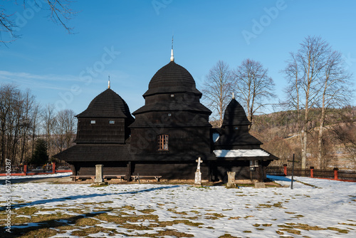 Exterior of Rownia Wooden Orthodox Church.  Bieszczady Architecture in Winter. Carpathia Region in Poland