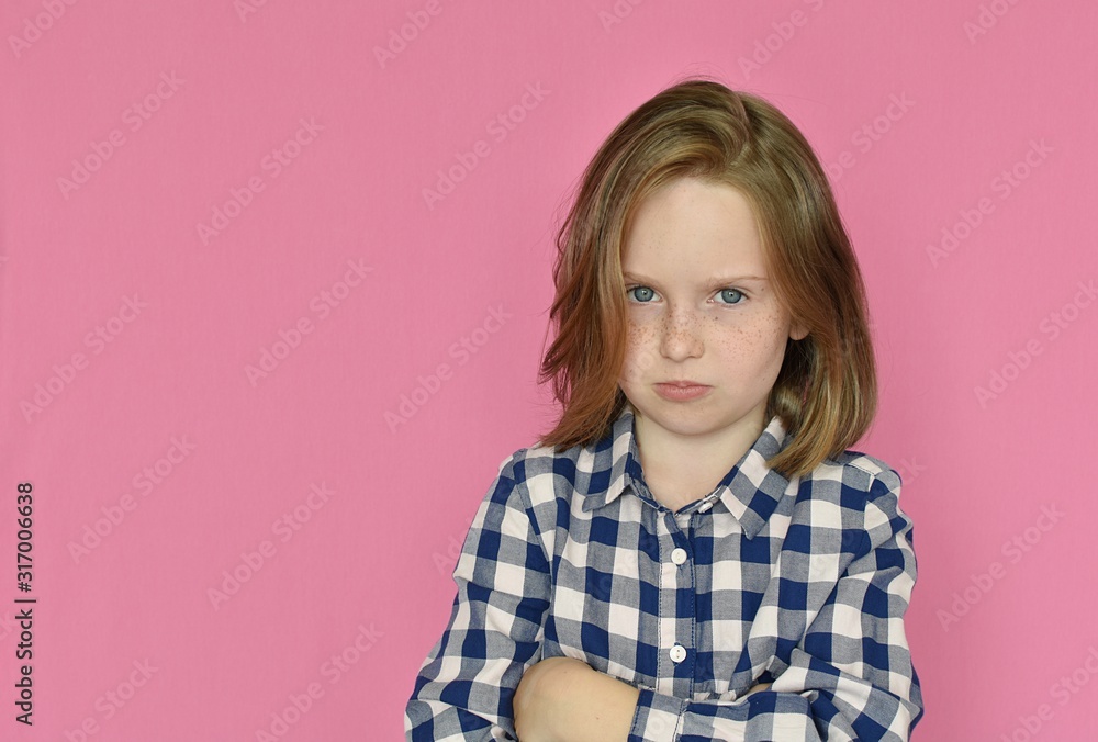 Studio portrait of unhappy, angry, not satisfied, stubborn girl on pink background. Studio portrait of unhappy, angry, not satisfied, stubborn girl on pink background.