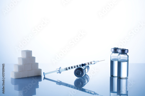 Diabetes,insulin,high blood sugar,hyperglycemia. Ampoules, vials, syringe. Medical injection,diseases,health care. Medical background with copy space Diabetes World Day