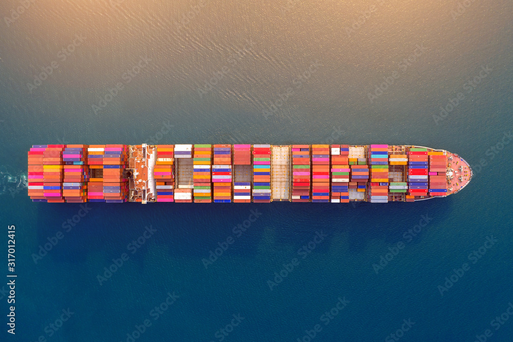 Aerial view of container cargo ship in sea. - obrazy, fototapety, plakaty 