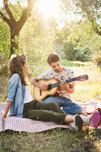Beautiful couple in love having a picnic © ballero