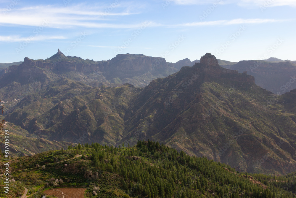 Great views of La Cilla viewpoint in Artenara town, Gran Canaria. Roque Nublo and Bentayga mountain peaks in Canary Islands, Spain Great views of La Cilla viewpoint in Artenara town, Gran Canaria. Roque Nublo and Bentayga mountain peaks in Canary Islands, Spain