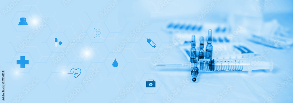 doctor injects the drug into the needle to treat and prevent the virus for the patient in laboratory, healthcare and icon medical network connection on virtual screen interface.Vaccination concept. doctor injects the drug into the needle to treat and prevent the virus for the patient in laboratory, healthcare and icon medical network connection on virtual screen interface.Vaccination concept.
