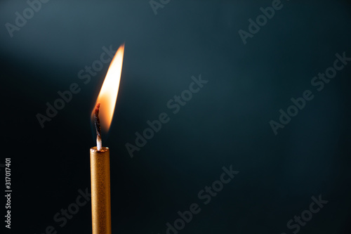 Lit candle