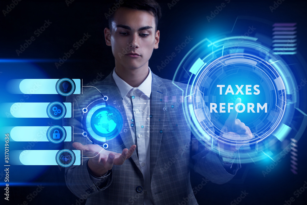 Business, Technology, Internet and network concept. Young businessman working on a virtual screen of the future and sees the inscription: Business, Technology, Internet and network concept. Young businessman working on a virtual screen of the future and sees the inscription: