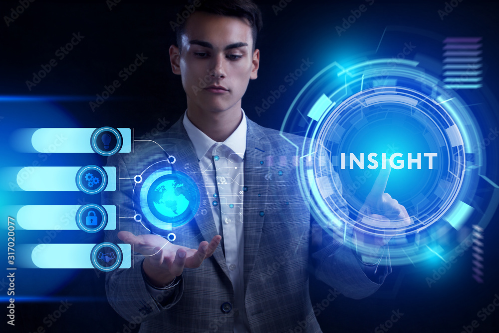 Business, Technology, Internet and network concept. Young businessman working on a virtual screen of the future and sees the inscription: Business, Technology, Internet and network concept. Young businessman working on a virtual screen of the future and sees the inscription: