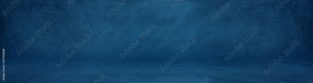 wide horizontal dark blue cement studio background to present product - obrazy, fototapety, plakaty 