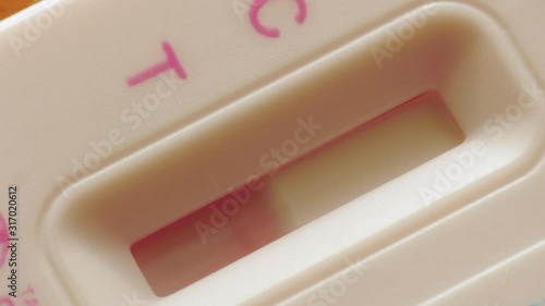 pregnancy test appears, appearing positive