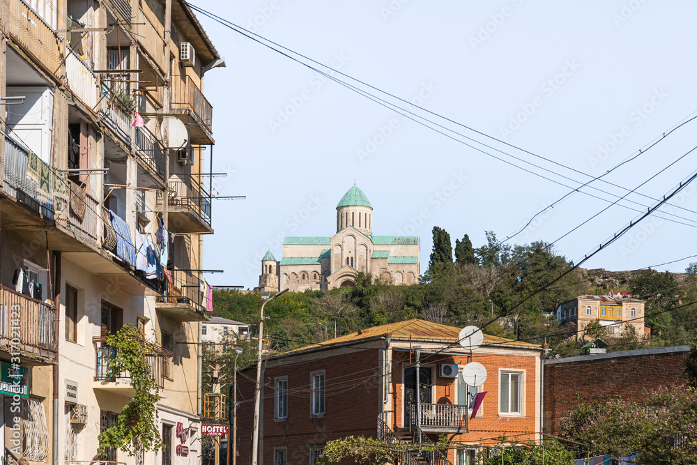 View of the Bagrati Cathedral from the street in the old part of Kutaisi in Georgia