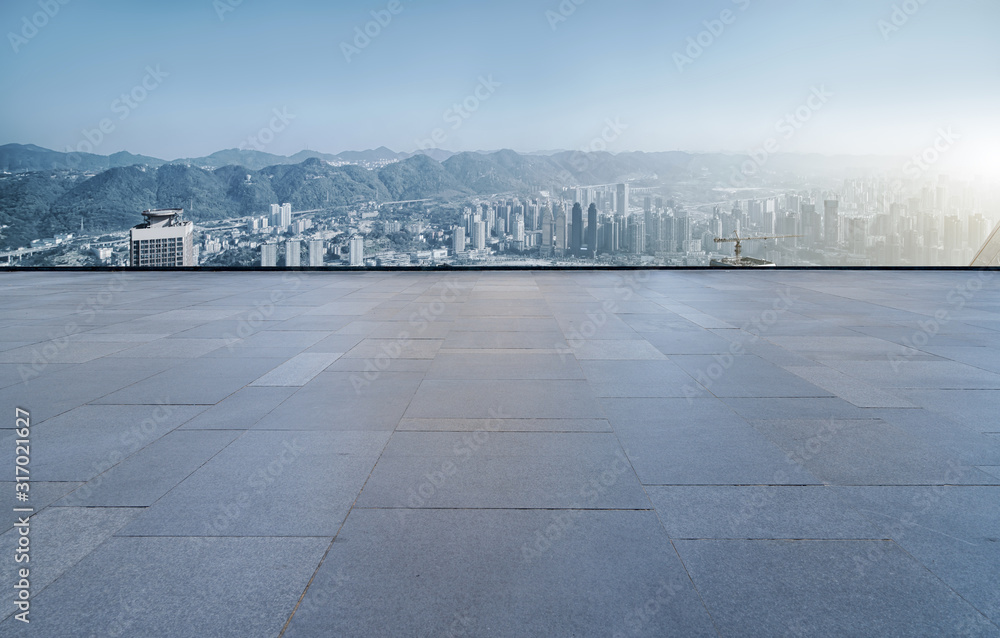 Square floor tiles and Chongqing urban building skyline..