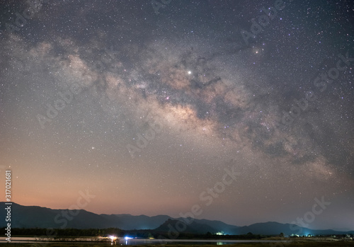 At night have stars, milky way and galaxies filled the dark sky.