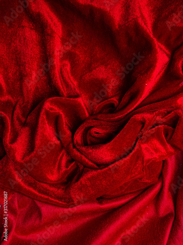 deep red velvet texture for background, red rose shape, love and passion concept. very affectionate and passionate.