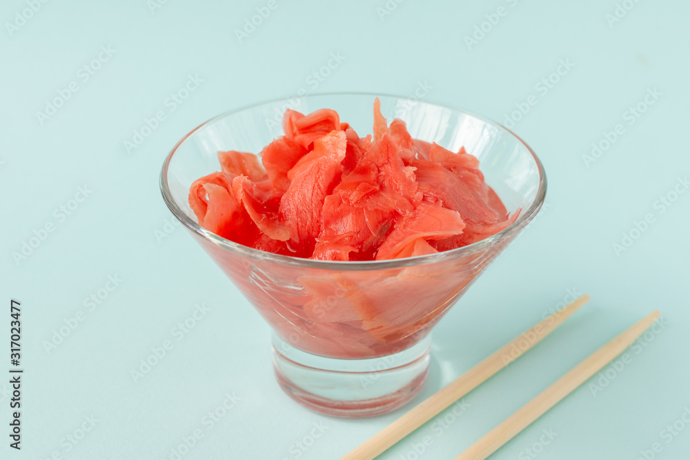 Pickled ginger with wooden sticks. Pickled ginger with wooden sticks.