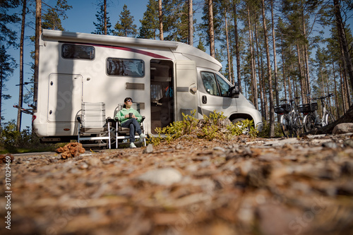 Family vacation travel RV, holiday trip in motorhome © Andrei Armiagov