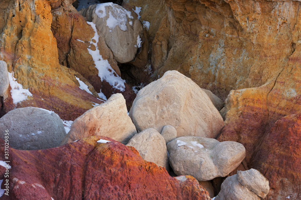 Winter landscape of the sandstone and clay geological formations at Paint Mines Interpretive Park, Calhan, Colorado, USA Winter landscape of the sandstone and clay geological formations at Paint Mines Interpretive Park, Calhan, Colorado, USA
